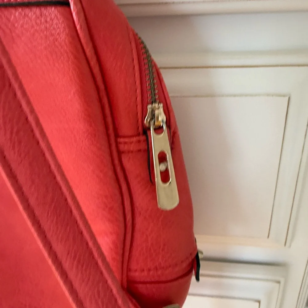 Salmon colored Real Italian leather mini backpack with gold hardware
